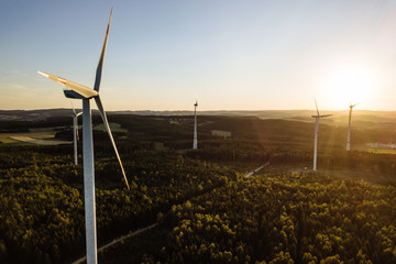 Wind Turbine in the sunset seen from an aerial view