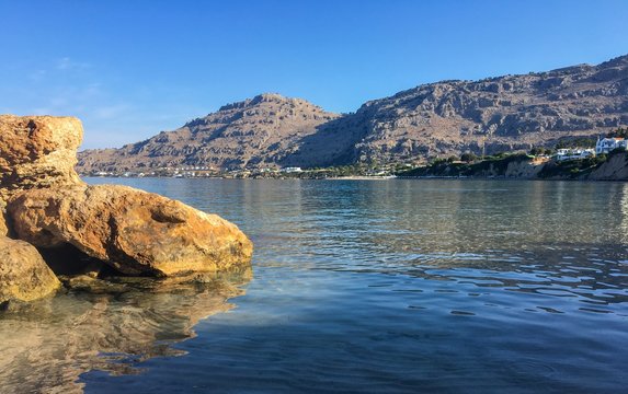 A view across the sea from a beautiful bay in Pefkos, Rhodes
