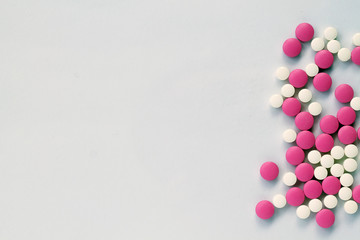 abstract background with pink and white pills