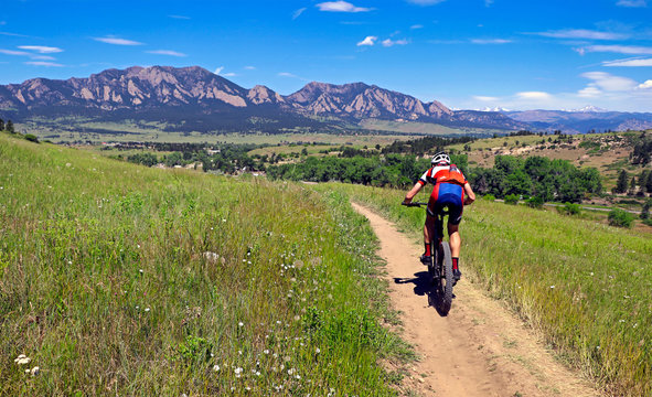 Mountain biker on a trail near Boulder, Colorado - Powered by Adobe