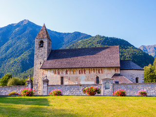 Fototapeta na wymiar View of San Vigilio Church and Cemetery in Pinzolo, Dolomites, Italy