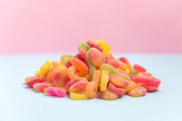 sugary candies isolated on a pink background