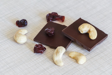 Milk chocolate, cashew nuts and dried cranberries as healthy snack