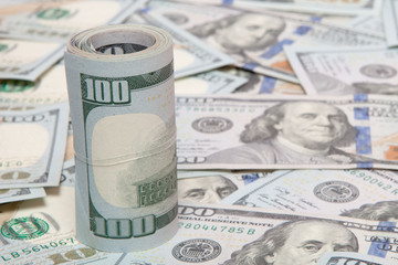Stack of dollars on money background