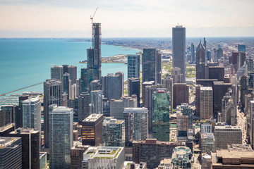 Fototapeta na wymiar Chicago city skyscrapers aerial view, blue sky background. Skydeck observation