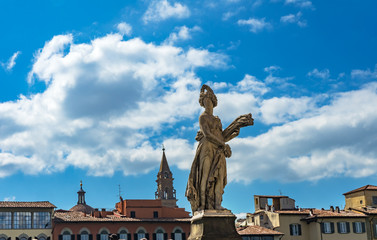 Fototapeta na wymiar Summer Statue Ponte Bridge Santa Trinita Arno River Florence Italy