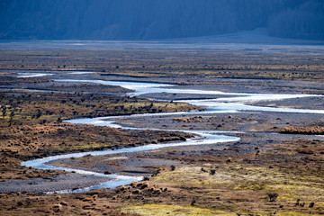 Pristine winding river amid rural wilderness in New Zealand