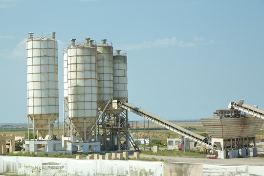 Cement manufacturers mine and process raw materials and put them through a chemical reaction process to create cement . Sand and stone destined to the manufacture of cement in a quarry.