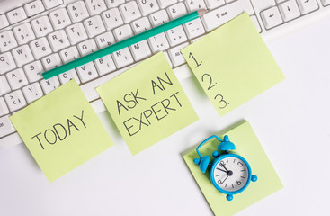 Writing note showing Ask An Expert. Business concept for consult someone who has skill about something or knowledgeable