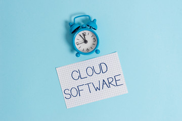 Word writing text Cloud Software. Business photo showcasing Programs used in Storing Accessing data over the internet Vintage alarm clock wakeup squared blank paper sheet colored background