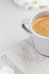 light grey mug with coffe light grey work feminine workspace minimalistic