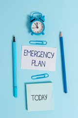 Writing note showing Emergency Plan. Business concept for Procedures for response to major...