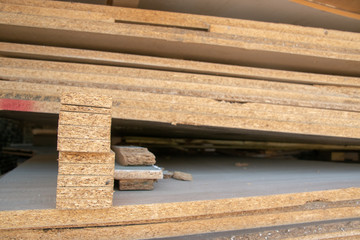 Taking photographs of wood plywood, used for making pellets