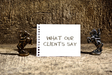 Conceptual hand writing showing What Our Clients Say. Concept meaning testimonials or feedback of...