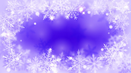 Christmas blurred background with frame of complex defocused big and small snowflakes in blue colors with bokeh effect