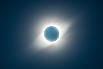 Naklejka na ściany i meble The Solar Corona atmosphere layer during Total Solar Eclipse Chile 2019, amazing view of the Sun covered by the Moon during totality phase while the Moon covers the entire Sun an awesome phenomenom