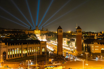 Fototapeta premium Barcelona, Spain - April, 2019: Night view of Plaza de Espana with Venetian towers. Barcelona