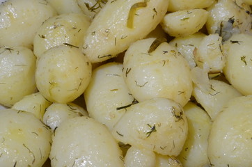  Boiled baby potatoes with dill and other spices.