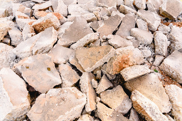 Broken asphalt and debris from some street repair work.