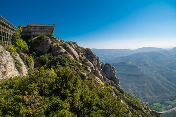 Montserrat, Spain - April, 2019: Santa Maria de Montserrat Abbey in Monistrol de Montserrat, Catalonia, Spain. Famous for the Virgin of Montserrat.