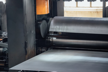 Pipe formation by using roll bending machine, close up