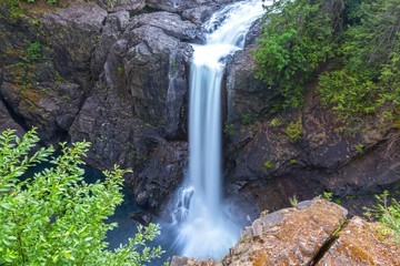 Scenic Landscape View, of High Waterfall Water Stream Cascade Flowing in Rock Canyon. Elk Falls Provincial Nature Park, Vancouver Island, British Columbia Canada