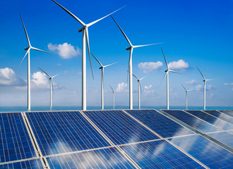 Solar energy panel photovoltaic cell and wind turbine farm power generator in nature landscape for...