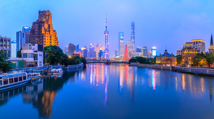 Shanghai city skyline and water reflection,China