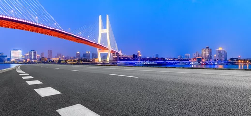 Cercles muraux Pont de Nanpu Shanghai Nanpu bridge and asphalt road scenery at night,China