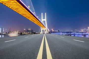 Photo sur Plexiglas Pont de Nanpu Shanghai Nanpu bridge and asphalt road scenery at night,China