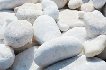 Fototapeta na wymiar White marble stones oval, beautiful background for spa. Photo picture.