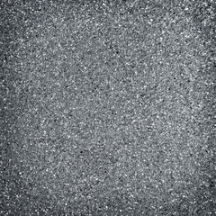 dark grey asphalt pavement texture with small rocks
