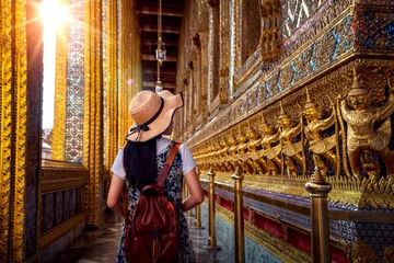 Papier Peint photo Bangkok Asian lady walking and travel in Wat Phra Kaew
