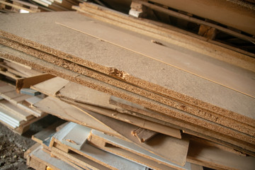 Taking photographs of wood plywood, used for making pellets