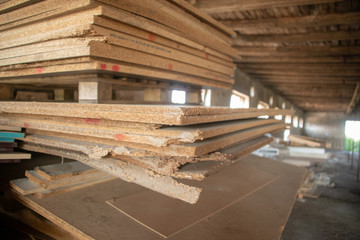 Taking photographs of wood plywood, used for making pellets