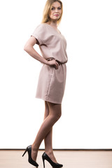 Female wearing casual pink tunic dress