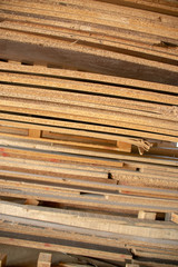 Taking photographs of wood plywood, used for making pellets