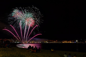Beautiful firework in a small Spanish town Palamos, day of celebrating the town 06. 26. 2019