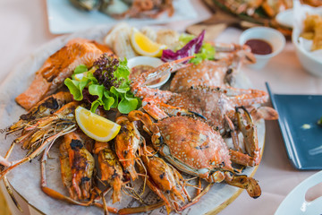 Delicious seafood of fresh seafood with shrimps, prawns, crabs, salmon, squid and mussels at luxury restaurant