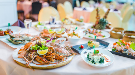 Delicious seafood of fresh seafood with shrimps, prawns, crabs, salmon, squid and mussels at luxury restaurant
