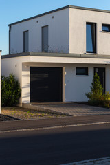 Fototapeta na wymiar carport garage of entrace area modern houses