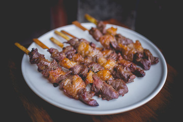 Homemade food of grilled beef meat with rosemary and pepper