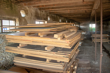 Taking photographs of wood plywood, used for making pellets