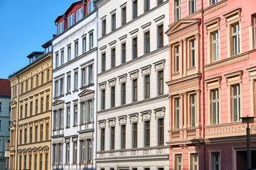 The fronts of some renovated old apartment buildings seen in Berlin, Germany
