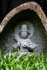 Fototapeta na wymiar ancient stone bodhisattva statue