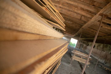 Taking photographs of wood plywood, used for making pellets