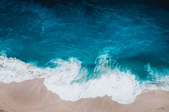 Wild beach, top view, waves