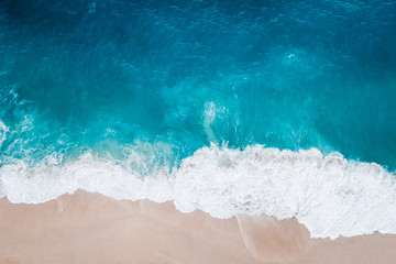 Wild beach, top view, waves