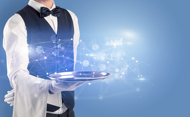 Young waiter serving financial concept on a metal tray