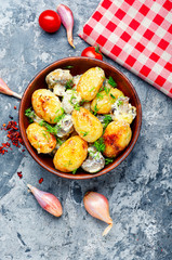 Baked potatoes with mushrooms